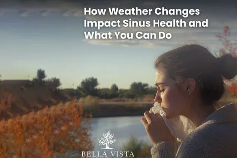 A person gazing at a lake with autumn trees, under text about sinus health and weather changes.